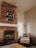 A cozy living room designed by akawell home showcasing harmony and balance.