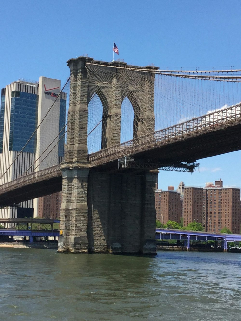 brown concrete Brooklyn bridge