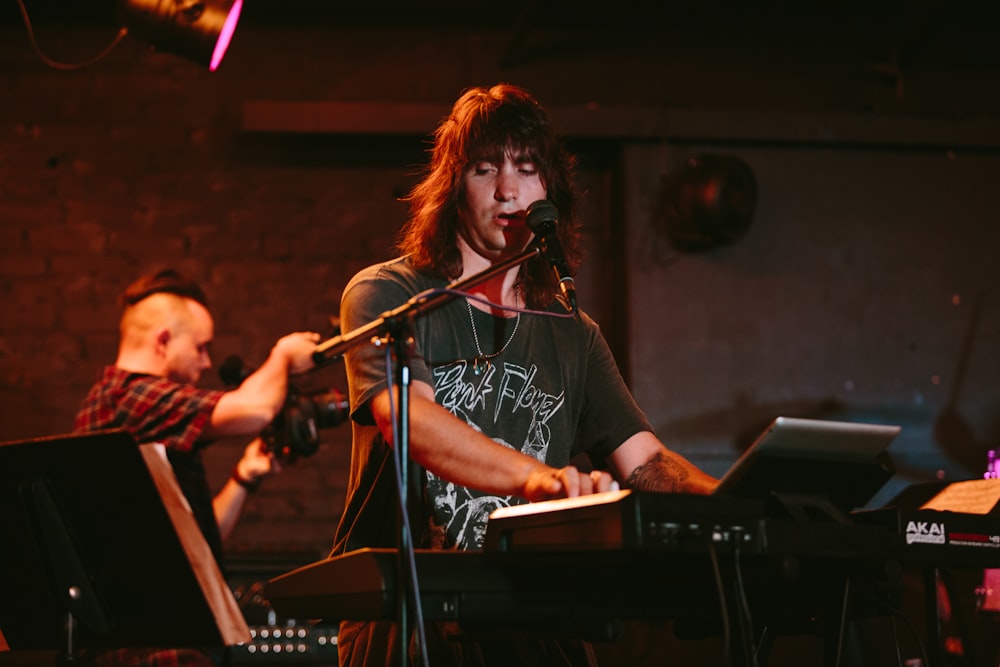 man playing keyboard