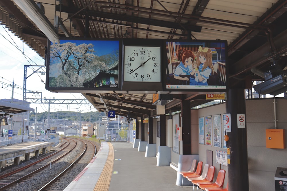 brown clock inside subway