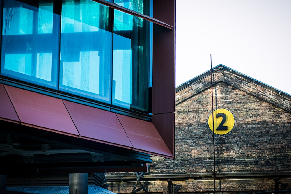 maroon building with blue glass window