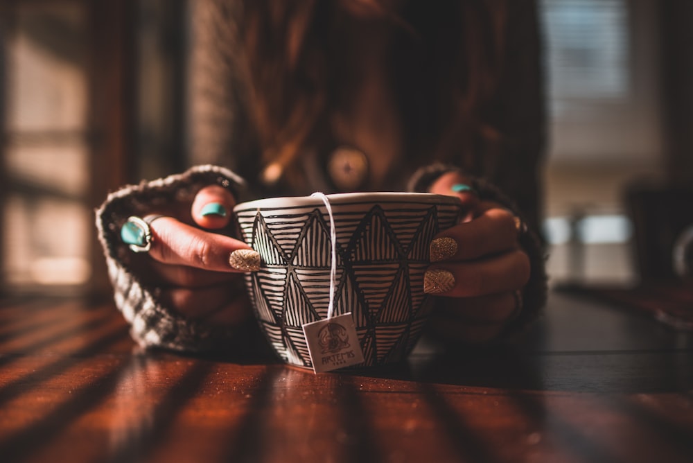 white and black mug