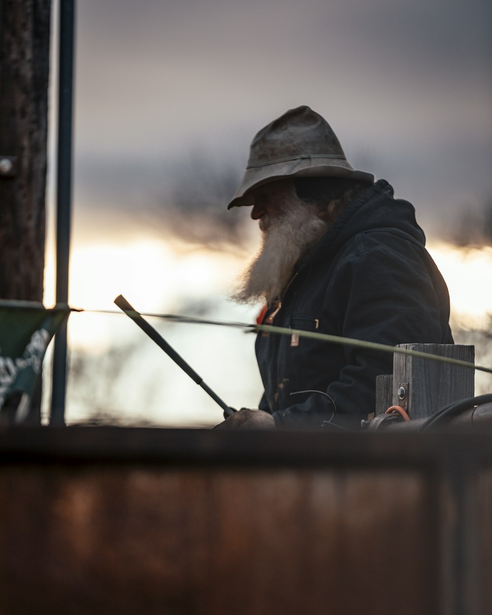 shallow focus photo of man wearing gray bucket