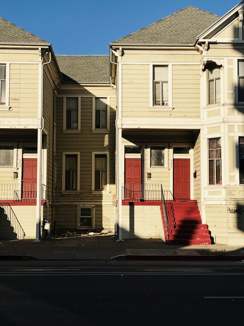 white 2-story house during daytime