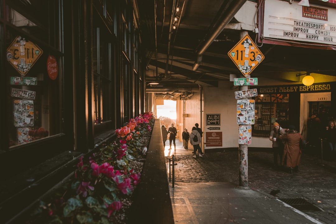 people standing in hallway, Pike Place Market in Seattle