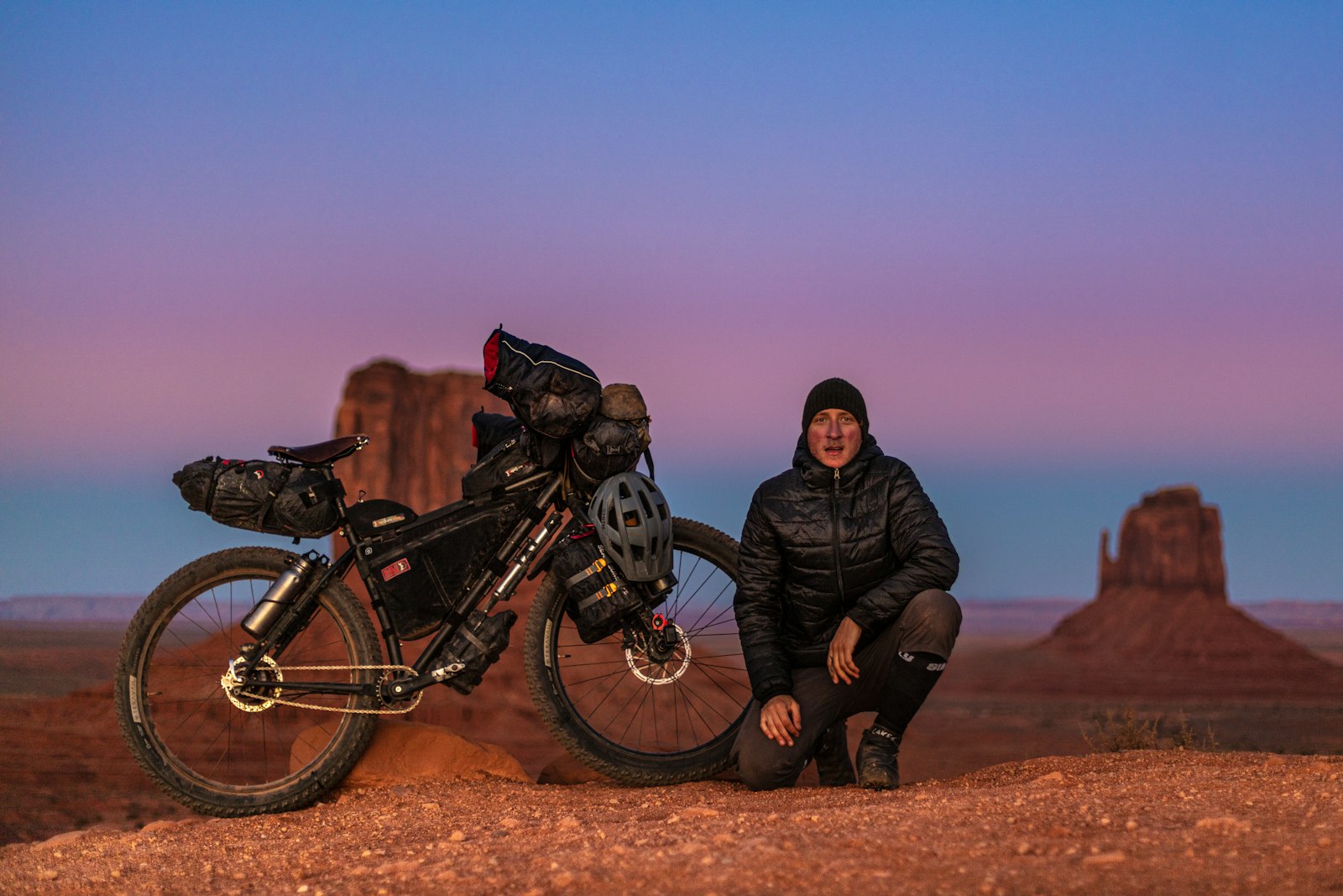 Canon EOS 5DS + Canon EF 50mm F1.4 USM sample photo. Man sitting near motorcycle photography