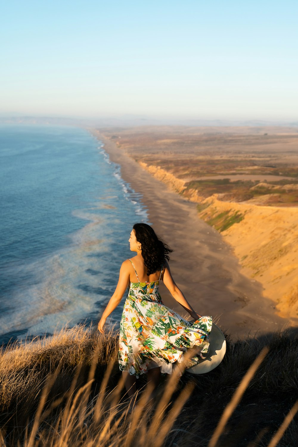 woman standing near shore