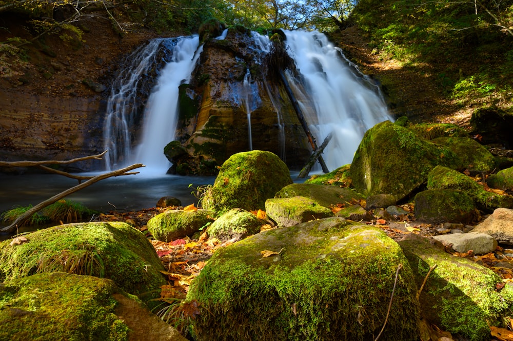 time lapse photography of waterfalls