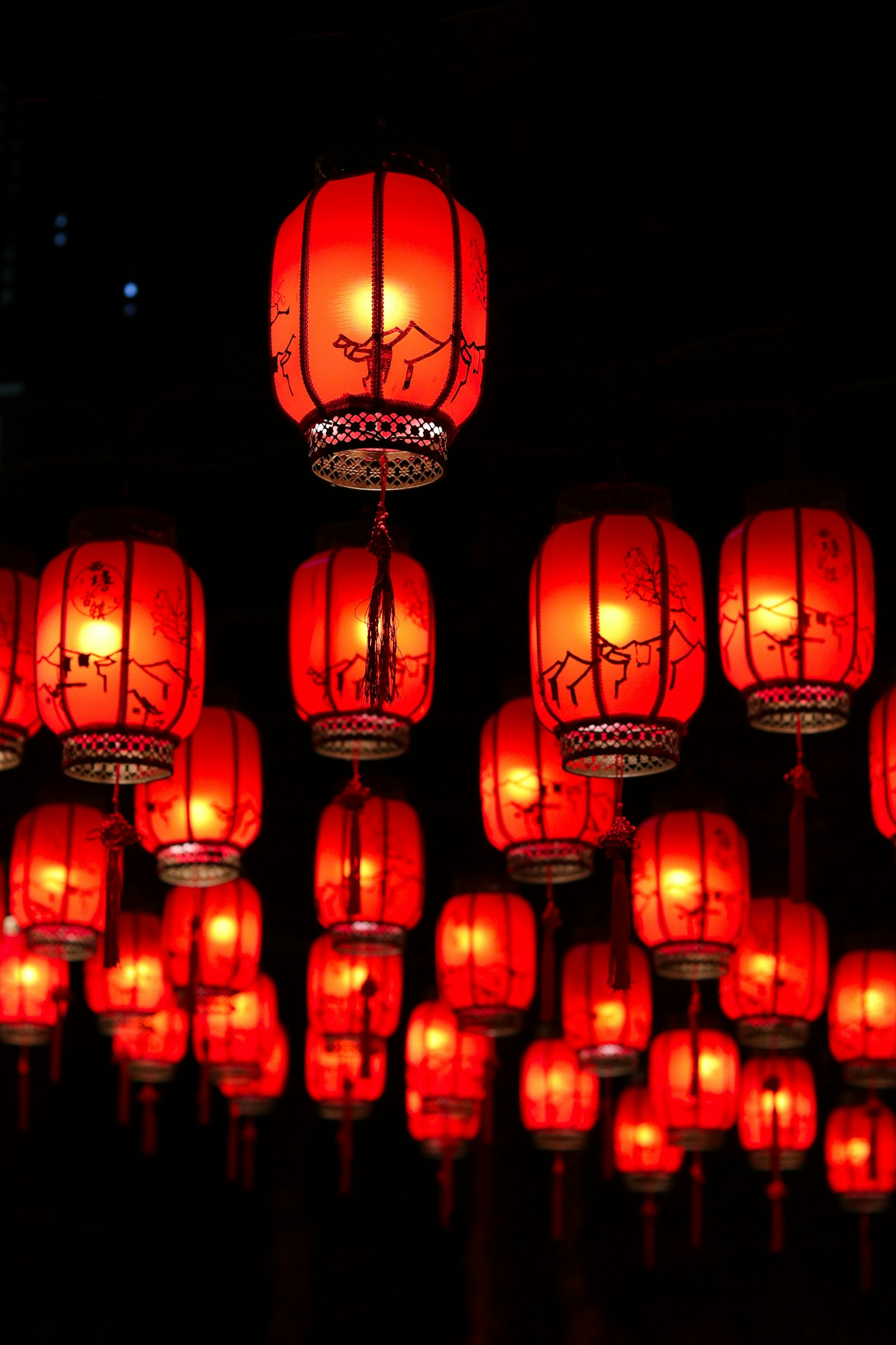 Red paper lanterns glowing at night