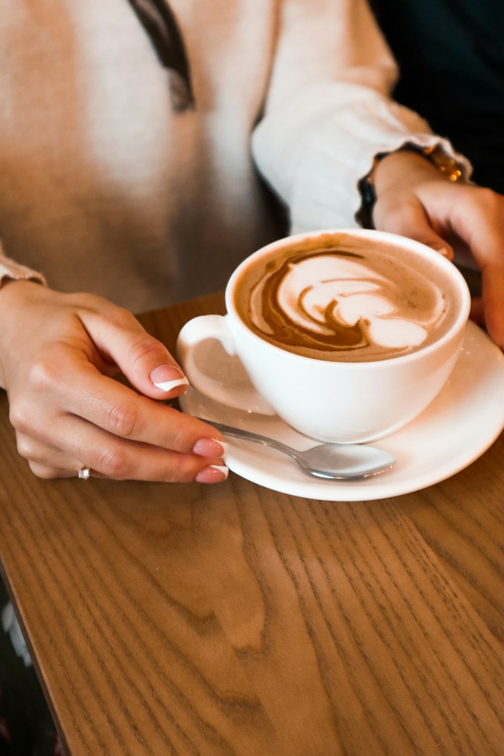 A cup of coffee on a plate photo – Free Drink Image on Unsplash