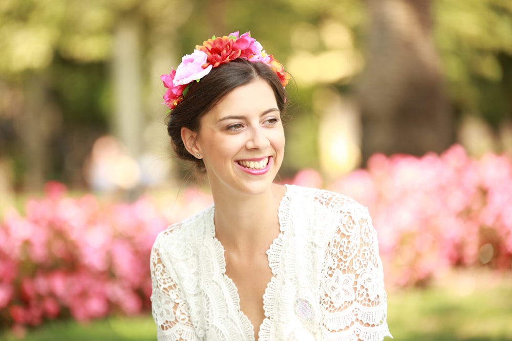 woman wearing white floral V-neck top