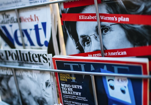 magazines displayed on a rack