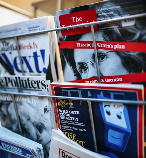 magazines displayed on a rack