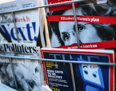 magazines displayed on a rack