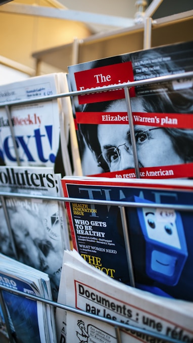 magazines displayed on a rack