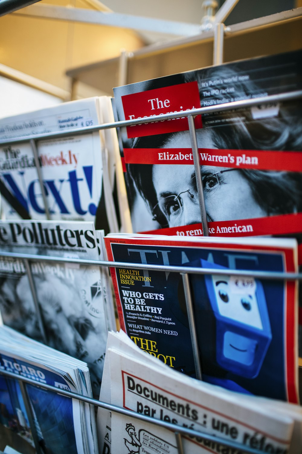 magazines displayed on a rack