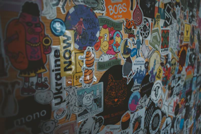 A collection of unique, colorful stickers with playful designs for personalizing devices.