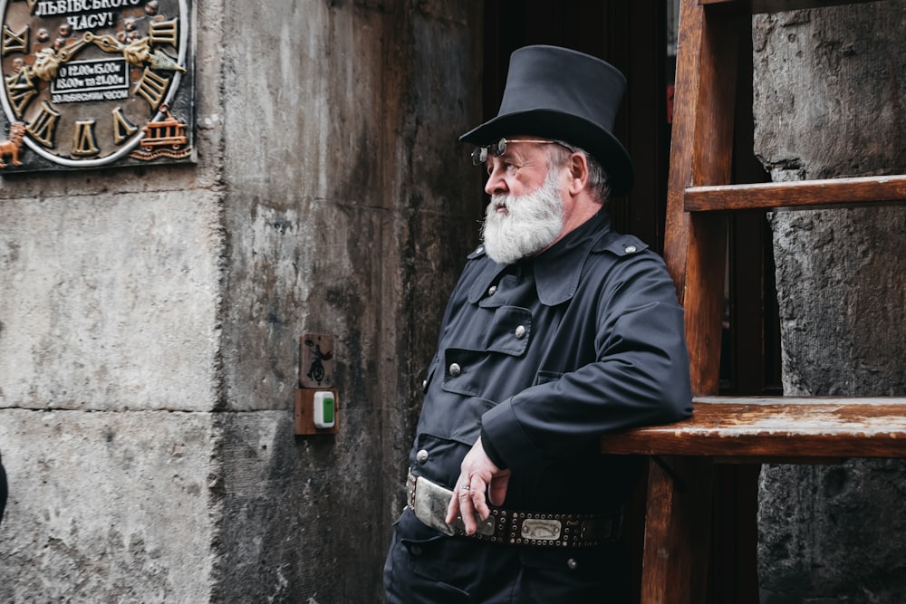 man standing beside stairs