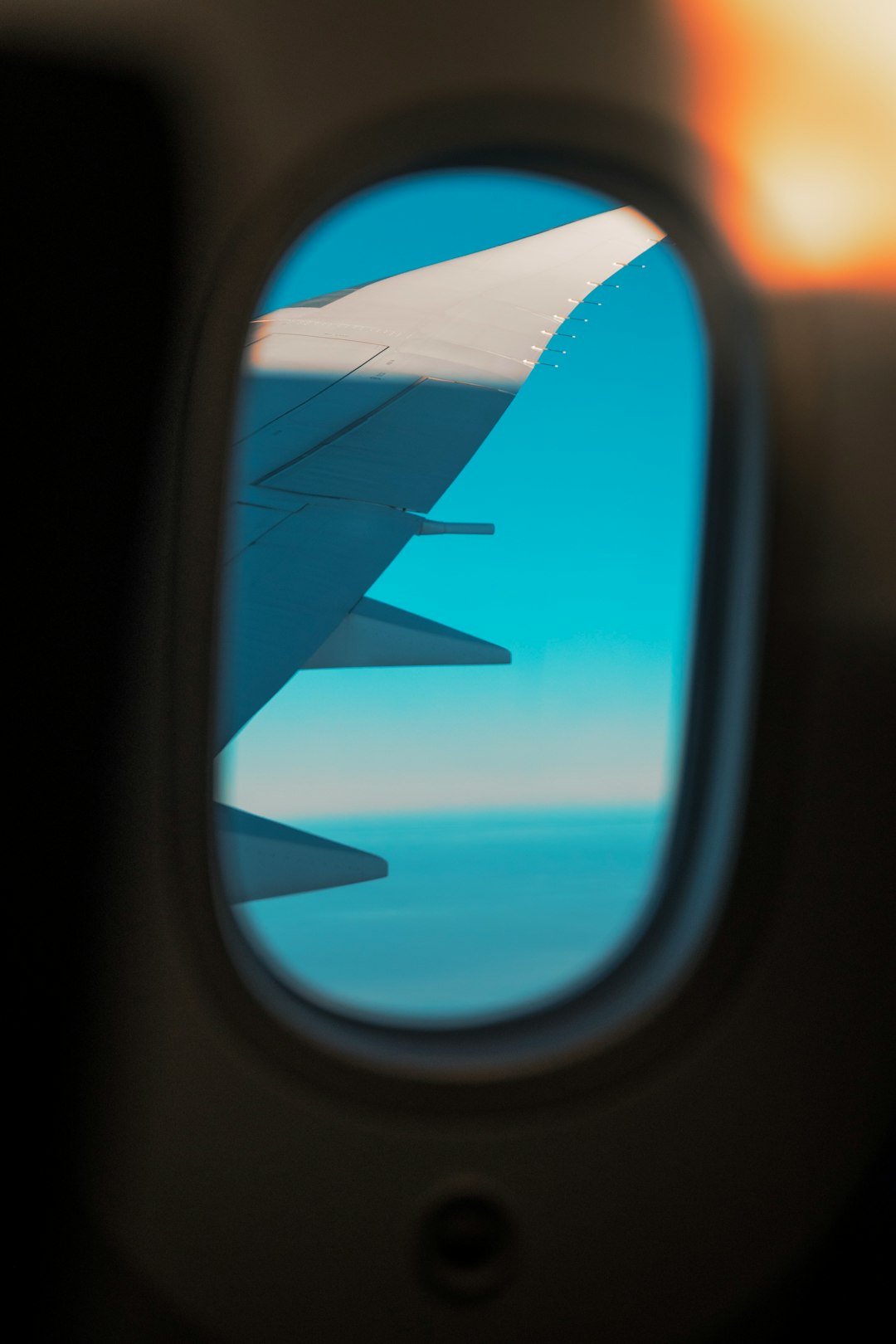 airliner window photography of wing
