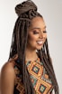 woman wearing multicolored blouse and braided hair