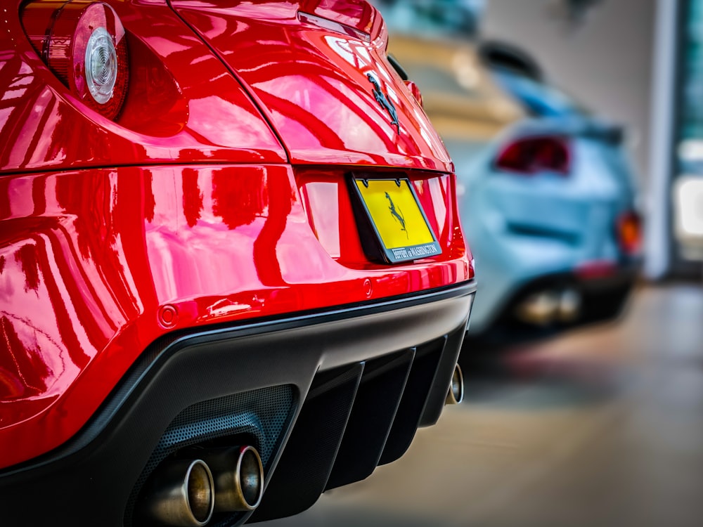 red Ferrari vehicle