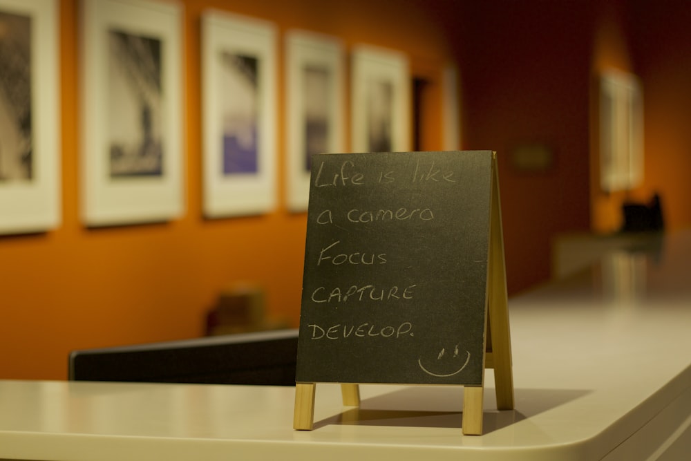 black and brown tabletop signage