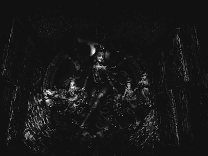 Vibrant depiction of Kali's fierce yet compassionate presence encircled by dynamic colors.