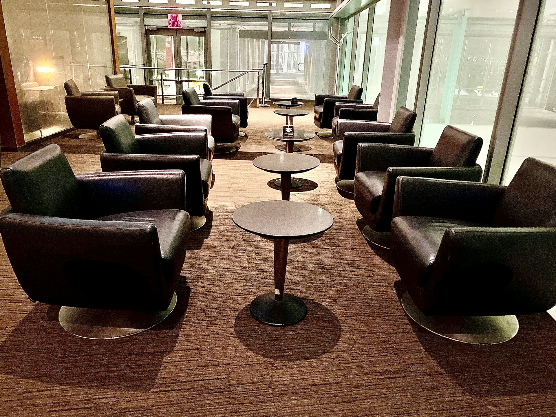 black leather chairs with table inside room