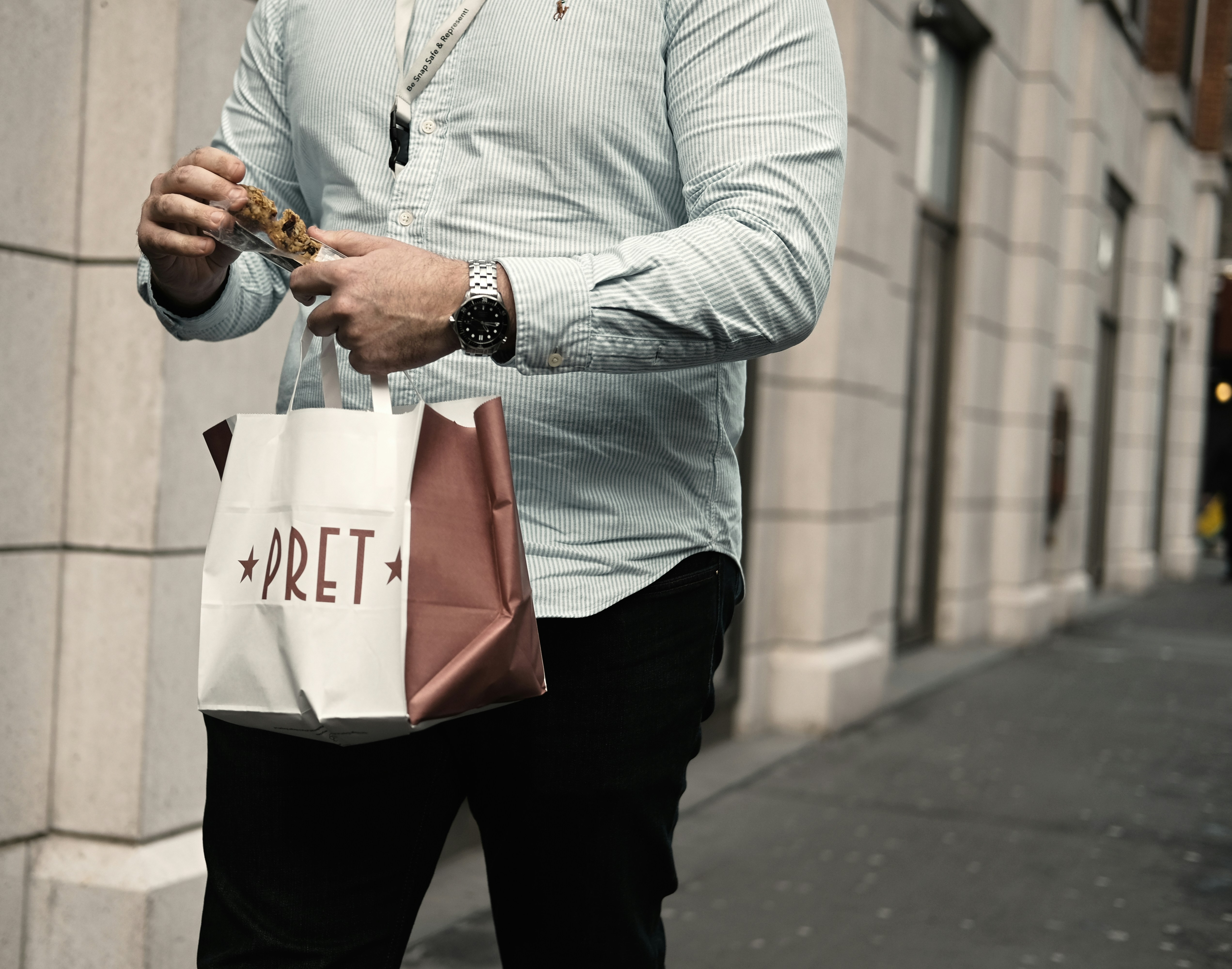 shallow focus photo of man in gray dress shirt