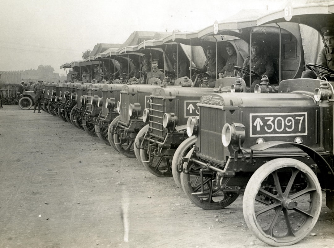 World War 1. Supply column waiting to load at a railway station.