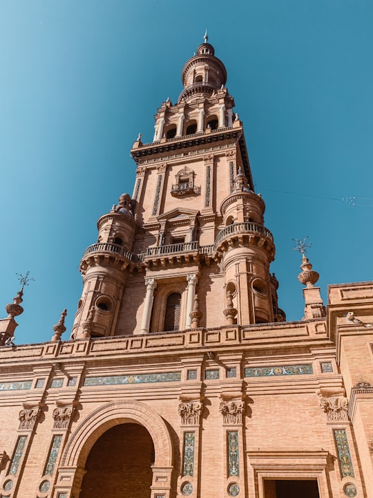 brown concrete building during daytime in Plaza de España Spain