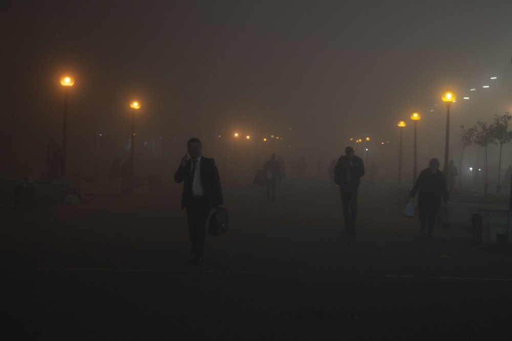 unknown persons walking outdoors