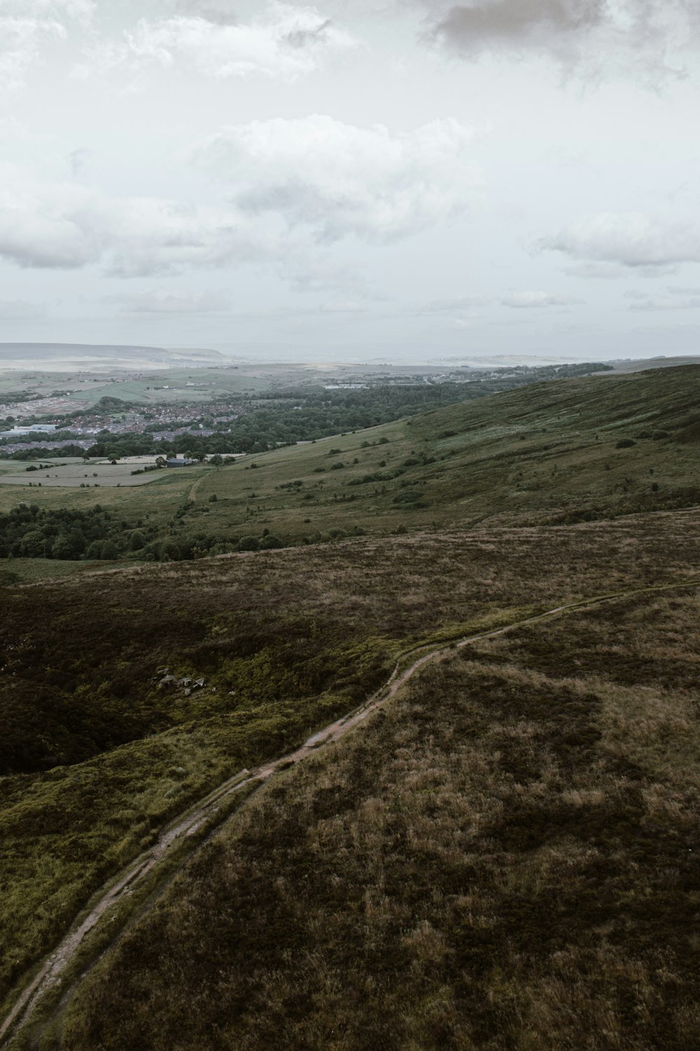 aerial photo of road on hill