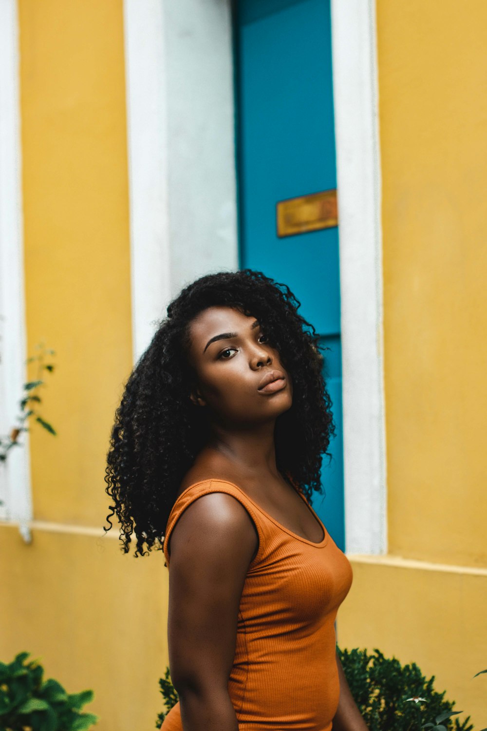 woman standing outside door