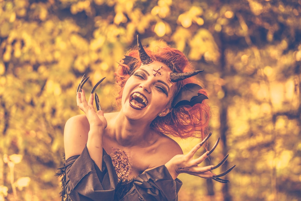 woman wearing devil costume