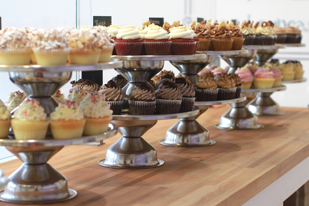 cupcakes placed on cupcake stands