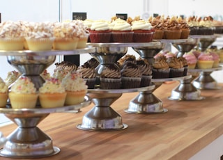 cupcakes placed on cupcake stands