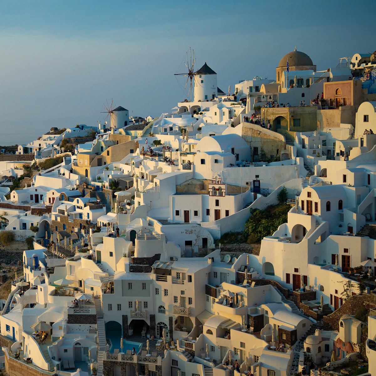 Scenic Greek coastal landscape with turquoise waters and whitewashed Cycladic architecture Santorini Greece