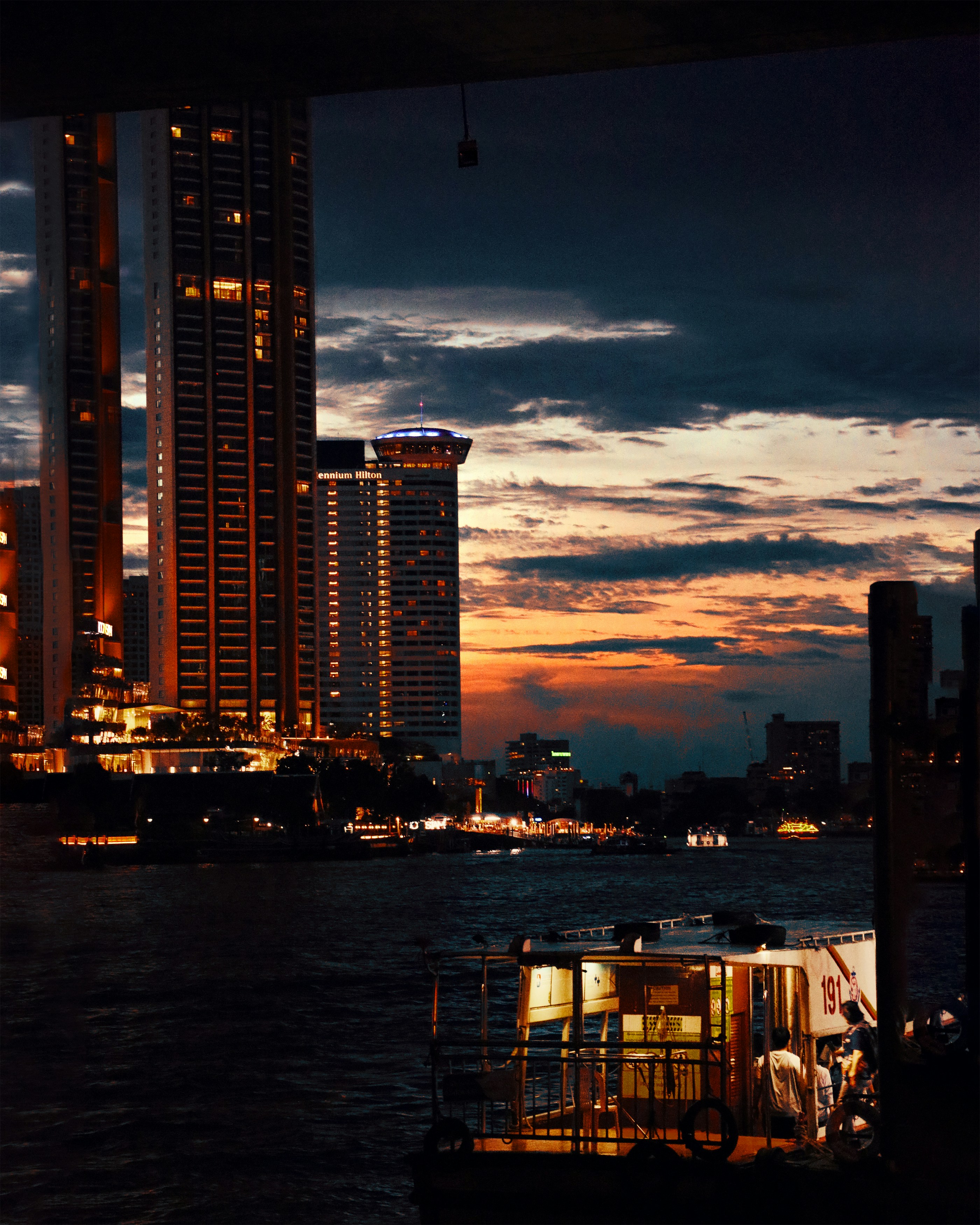 lighted grey concrete building during daytime