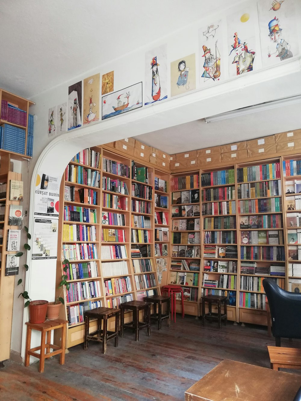 assorted title books on shelf inside room