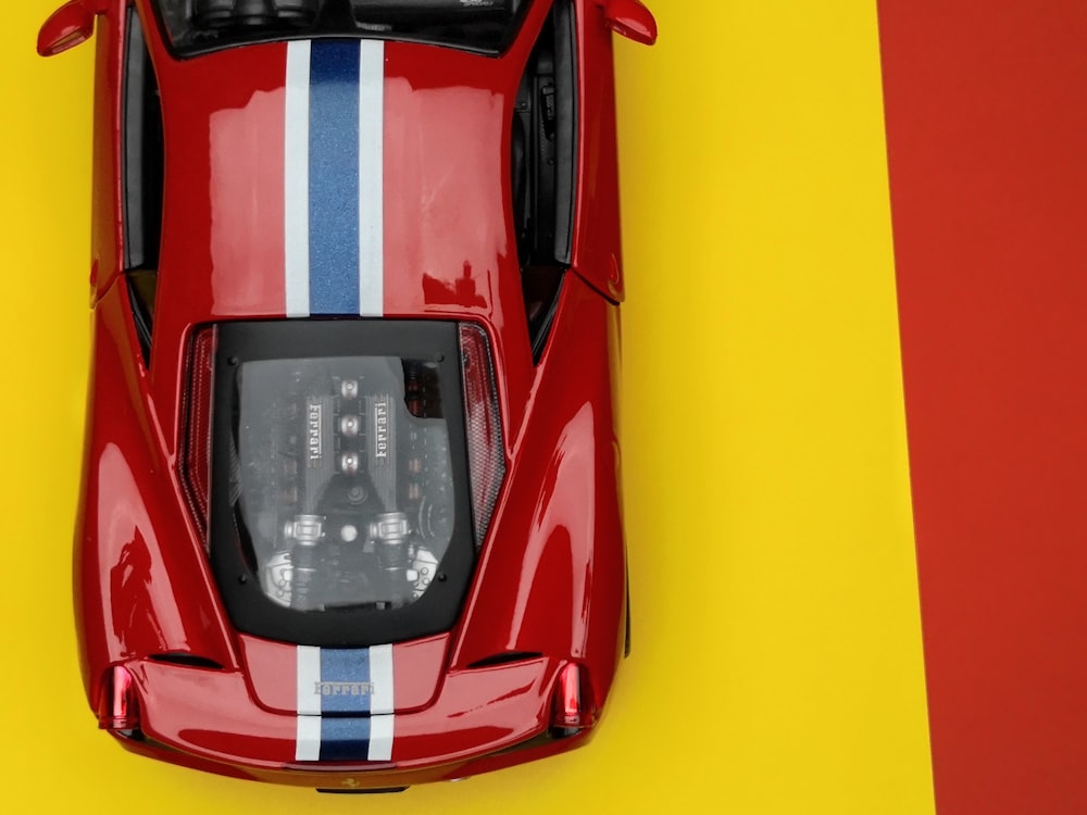 close view of red sports car diecast model