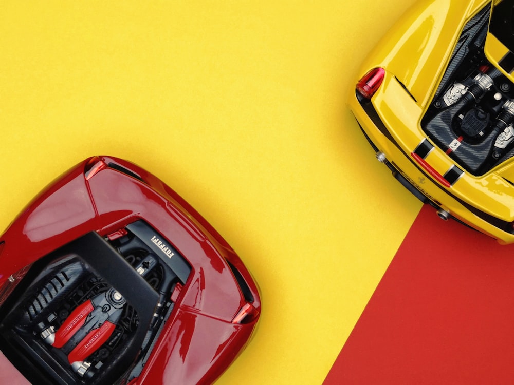 red and yellow luxury vehicles