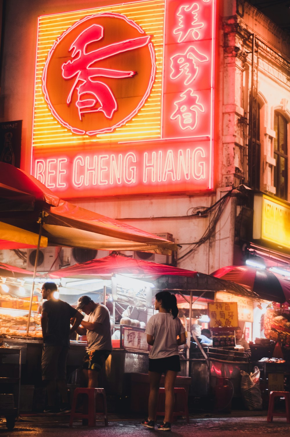 red and yellow neon light signage