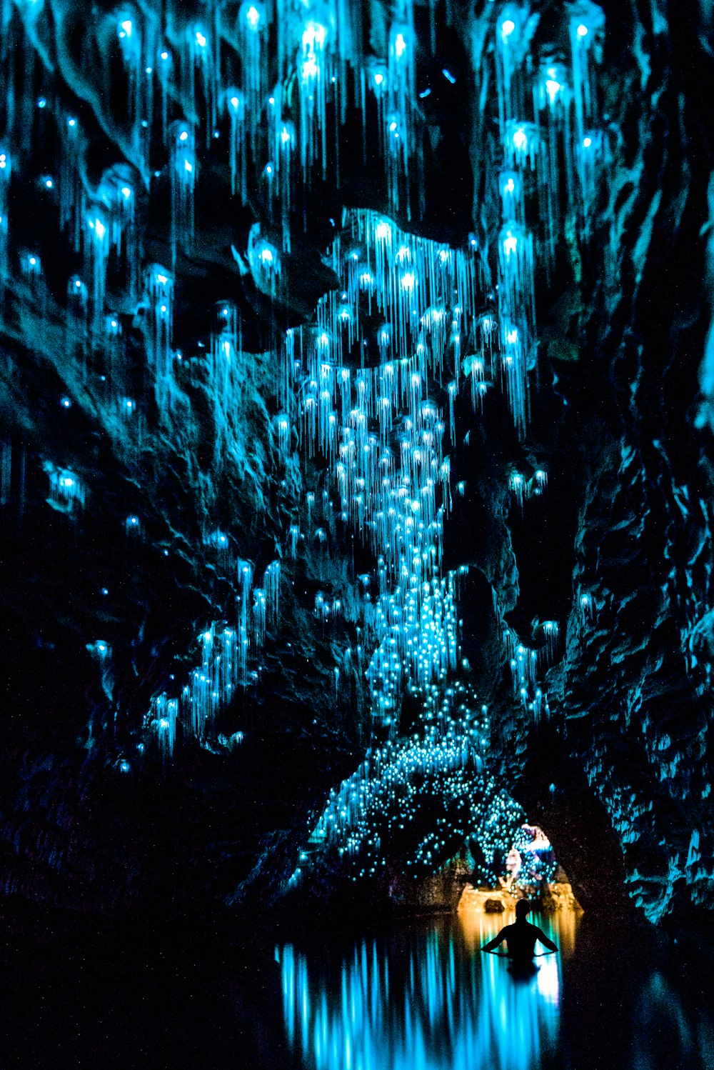 blue waterfalls during daytime