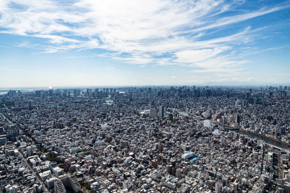 cityscape under blue \and white sky