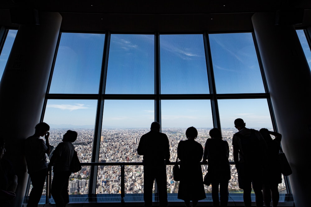 silhouette photography of people in building