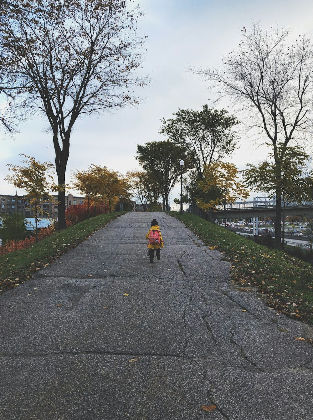 child walking near river