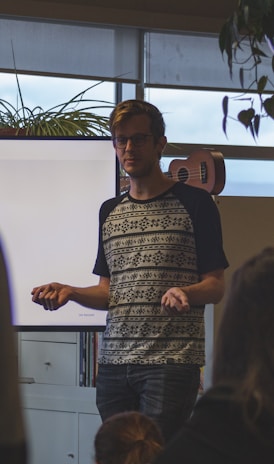 man standing near board