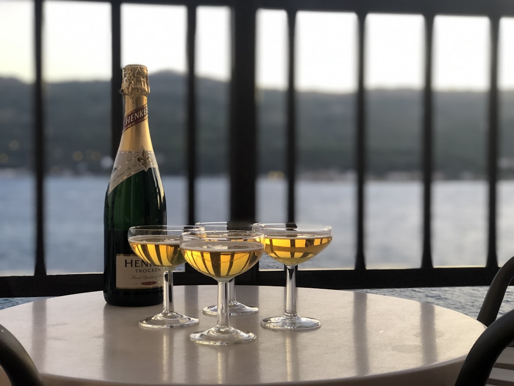 four martini glasses on table