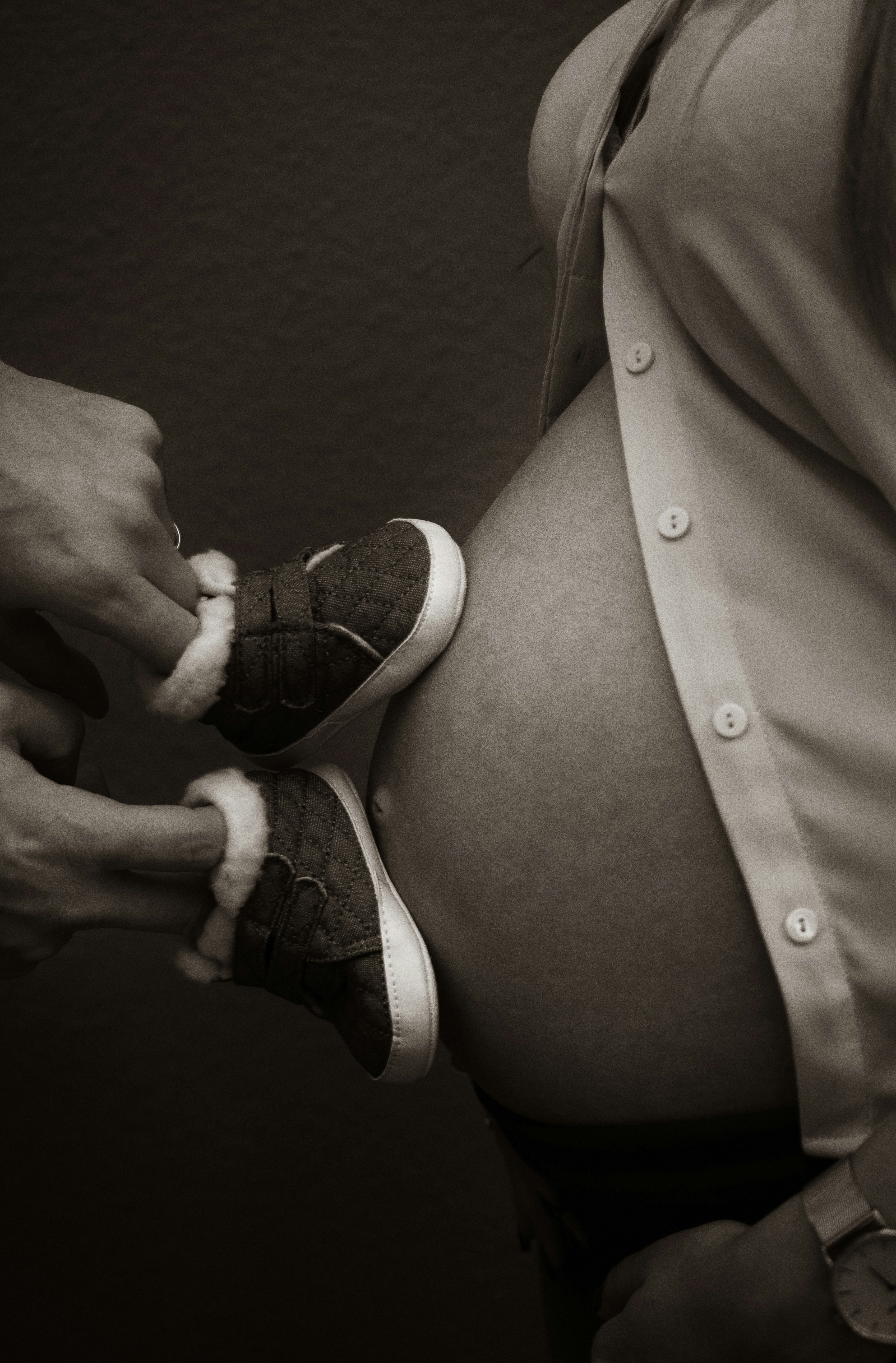 grayscale photography of pregnant woman